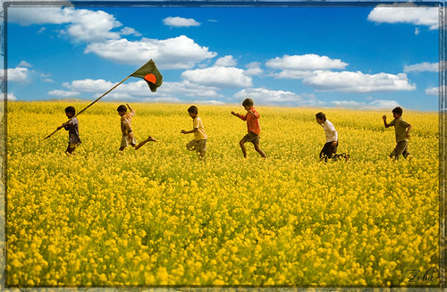 Illustration of a diverse group of people singing a national anthem, symbolizing unity and cultural heritage, with Bangladesh's flag and global landmarks in the background. বিভিন্ন গোষ্ঠীর মানুষ জাতীয় সংগীত গাইছে, ঐক্য ও সাংস্কৃতিক ঐতিহ্যের প্রতীক, পটভূমিতে বাংলাদেশের পতাকা এবং বিশ্বের বিভিন্ন ল্যান্ডমার্ক সহ একটি চিত্র।